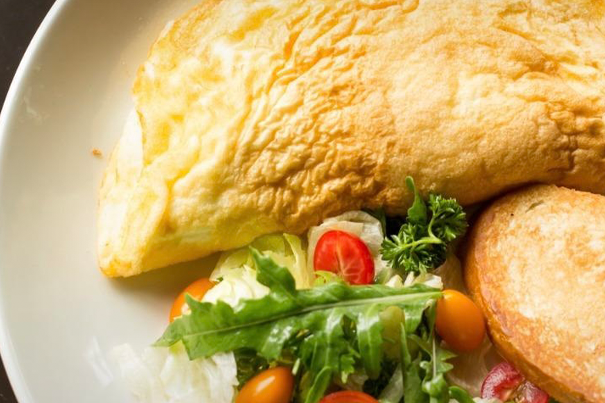 Truffled scrambled eggs on sourdough toast at Boujee House Kolkata